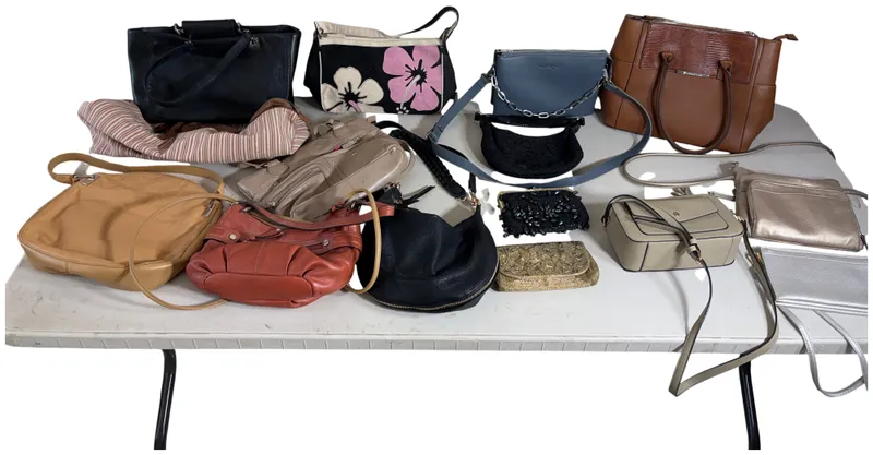 An Assortment of Designer and Contemporary Leather and Fabric Handbags from auction in Lancaster, Ohio