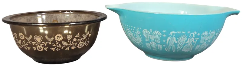 Two Vintage American Glass Mixing Bowls featuring Pyrex Butterprint and Corning Patterns from auction in Lancaster, Ohio