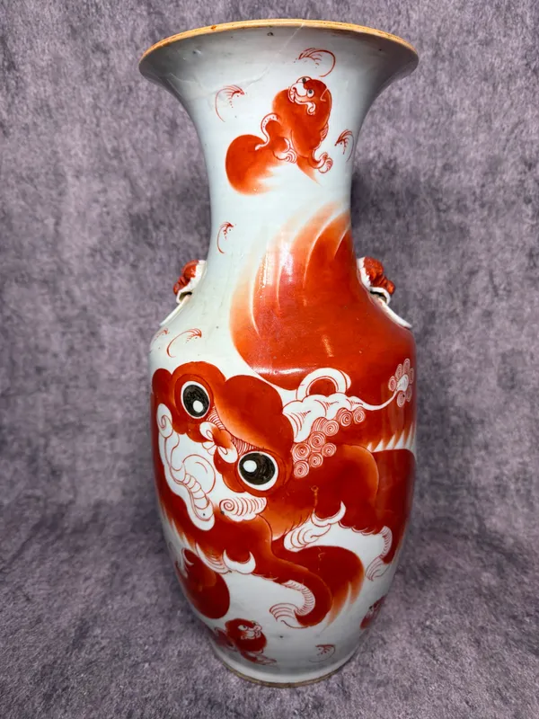Large Chinese Iron Red and White Porcelain Buddhist Lion Vase from auction in Lancaster, Ohio
