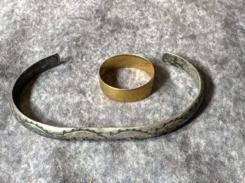 A 3.5 Gram 18K Yellow Gold Band Ring and a 12.8 Gram Sterling Silver Etched Cuff Bracelet from auction in Lancaster, Ohio