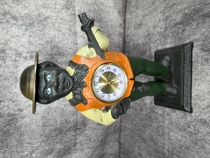 Reproduction Cast Iron Black Americana Banjo Player Mantel Clock from auction in Lancaster, Ohio