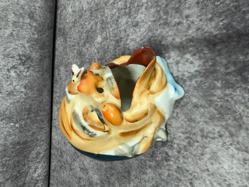 Vintage Mid-Century Ceramic Winking Man Novelty Character Vessel Made in Japan from auction in Lancaster, Ohio