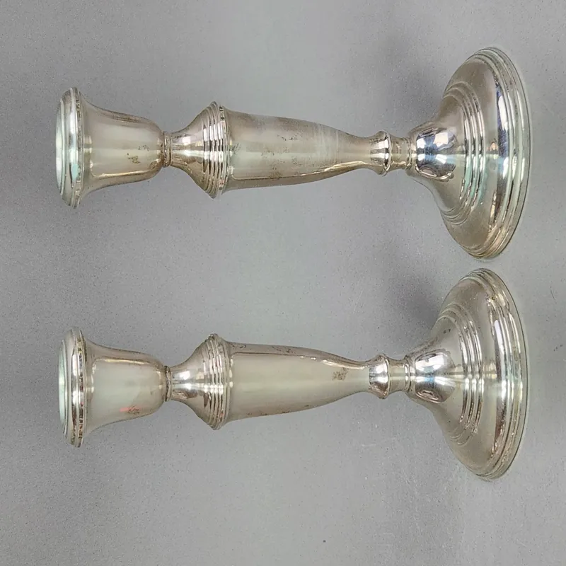 Empire Sterling Weighted Candlesticks 23 Grams from auction in Okemos, Michigan