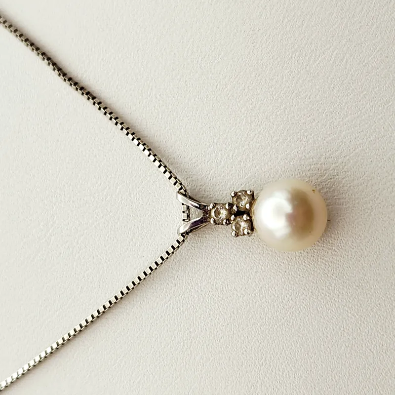 14K Gold Pearl Necklace  3.8 Grams from auction in Okemos, Michigan