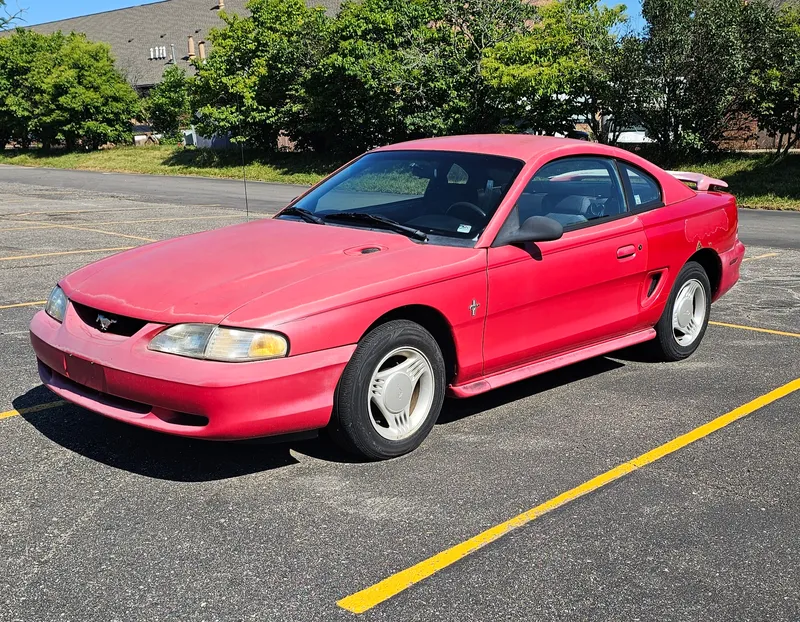 1995 Ford Mustang Base Coupe from auction in Okemos, Michigan