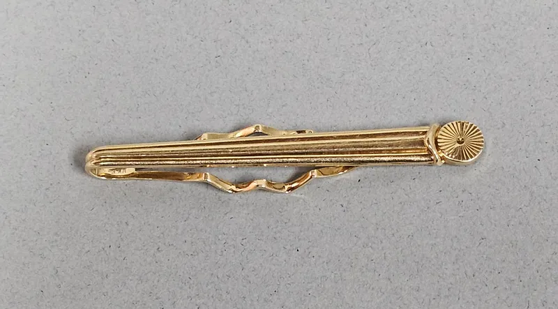 14K Yellow Gold Triple-Ribbed Tie Clip 6.6 Grams from auction in Okemos, Michigan