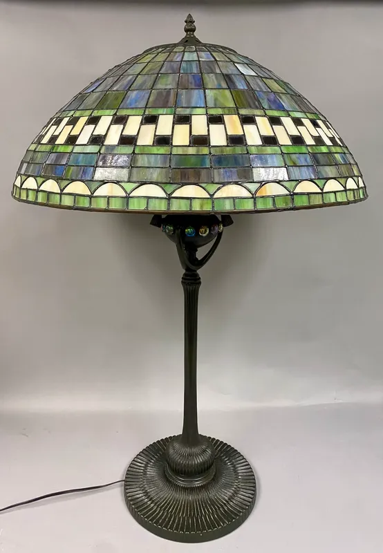 Tiffany-Style Geometric Leaded Glass Table Lamp from auction in Okemos, Michigan