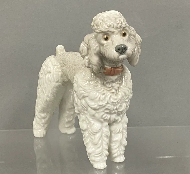 Lladro Porcelain Standing Poodle Figurine from auction in Okemos, Michigan